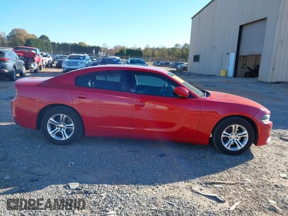 ✅ 2015 Dodge Charger SE • VIN: 2C3CDXBG7FH771195 • Lot: 43637158. Listed on IAAI with 195,044 mi. Free auction sales archive from the USA and detailed vehicle history report at DreamBid. Image 13.
