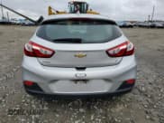 ✅ 2018 Chevrolet Cruze LT • VIN: 3G1BE6SM4JS604182 • Lot: 71157182. Listed on Copart with 23,717 mi. Free auction sales archive from the USA and detailed vehicle history report at DreamBid. Image 6.