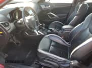 ✅ 2013 Hyundai Veloster Turbo • VIN: KMHTC6AE4DU179641 • Lot: 85915125. Listed on Copart with 95,967 mi. Free auction sales archive from the USA and detailed vehicle history report at DreamBid. Image 7.