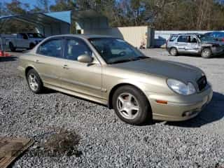 2004 Hyundai Sonata GLS with VIN KMHWF35H64A003084, listed as a Copart auction lot 83238544 with 179,054 mi miles and Salvage title. Bid and sale history available at DreamBid. Image 4.