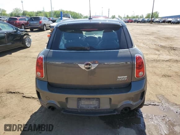 ✅ 2012 MINI Countryman S • VIN: WMWZC5C56CWM14210 • Lot: 57466485. Listed on Copart with 114,029 mi. Free auction sales archive from the USA and detailed vehicle history report at DreamBid. Image 6.