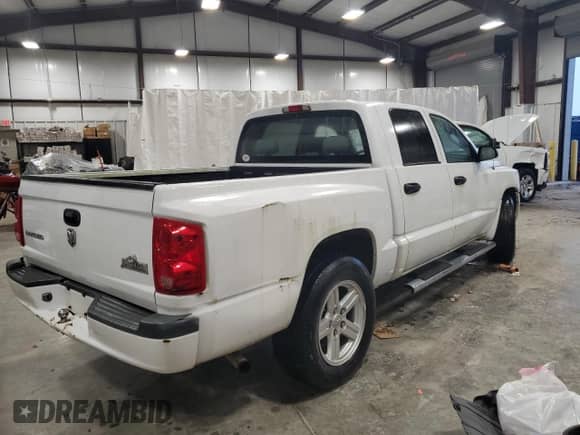 2008 Dodge Dakota Bighorn/Lonestar with VIN 1D7HE38K88S590577, listed as a Copart auction lot 73517754 with 128,163 mi miles and Salvage title. Bid and sale history available at DreamBid. Image 3.