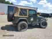 2005 Jeep Wrangler X с VIN 1J4FA39S45P319326, выставлен на аукционе Copart как лот 64983495 с пробегом 156 551 миль миль и Списание • Salvage title. История ставок и продаж доступна на DreamBid. Изображение 3.