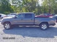 ✅ 2013 Toyota Tacoma • VIN: 3TMMU4FN3DM061944 • Lot: 42867859. Listed on IAAI with 183,857 mi. Free auction sales archive from the USA and detailed vehicle history report at DreamBid. Image 14.