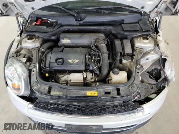 ✅ 2013 MINI Hardtop S • VIN: WMWSV3C59DT389015 • Lot: 84606325. Listed on Copart with 129,701 mi. Free auction sales archive from the USA and detailed vehicle history report at DreamBid. Image 12.