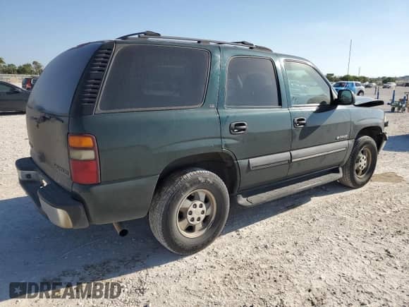 2002 Chevrolet Tahoe LS с VIN 1GNEC13Z92R195793, выставлен на аукционе Copart как лот 86814955 с пробегом 219 576 миль миль и Списание • Salvage title. История ставок и продаж доступна на DreamBid. Изображение 3.