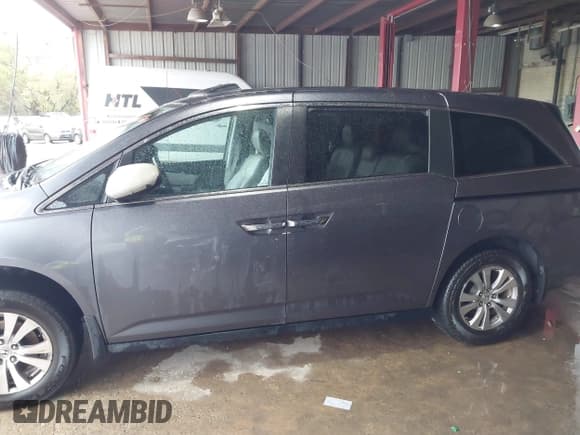✅ 2014 Honda Odyssey EX-L • VIN: 5FNRL5H65EB024517 • Lot: 43783038. Listed on IAAI with 195,775 mi. Free auction sales archive from the USA and detailed vehicle history report at DreamBid. Image 14.