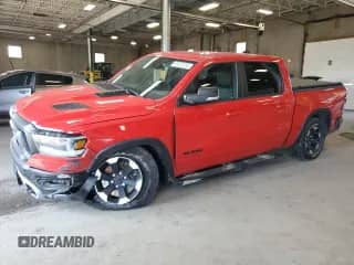 2022 Ram 1500 Rebel with VIN 1C6SRFLT4NN204034, listed as a Copart auction lot 66528785 with 80,073 mi miles and Salvage title. Bid and sale history available at DreamBid. Image 1.