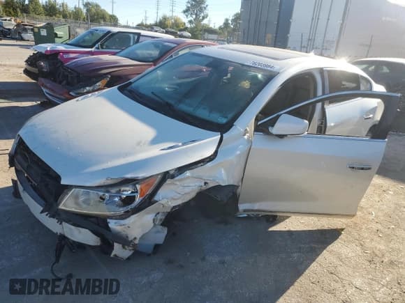 ✅ 2012 Buick LaCrosse Leather • VIN: 1G4GL5E33CF204861 • Лот: 76203984. Опубликован ранее на Copart с пробегом 147 934 миль. Бесплатный доступ к архиву аукционных продаж из США и подробный отчёт об истории автомобиля на DreamBid. Изображение 1.