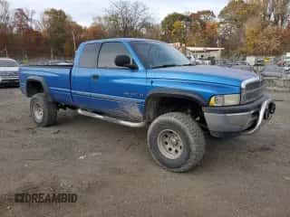 2001 Dodge 1500 z VIN 3B7HF13Y41G731181, wystawiony jako Copart lot #79361254 z przebiegiem 131 262 mil mil oraz Czysty tytuł • Clean title. Historia ofert i sprzedaży dostępna na DreamBid. Obrazek 4.
