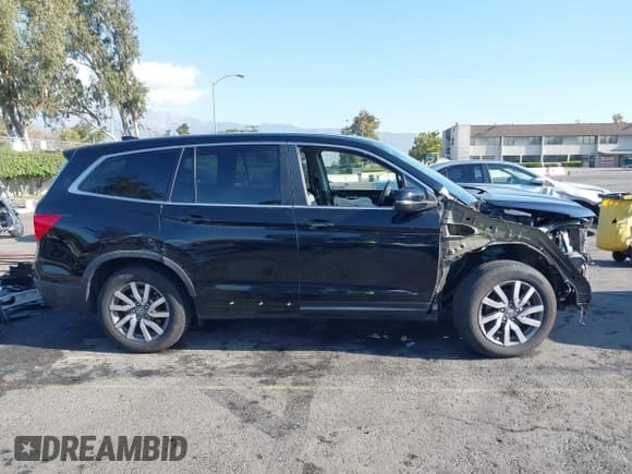 ✅ 2019 Honda Pilot EX-L • VIN: 5FNYF5H58KB044315 • Lot: 43127518. Listed on IAAI with 63,216 mi. Free auction sales archive from the USA and detailed vehicle history report at DreamBid. Image 14.