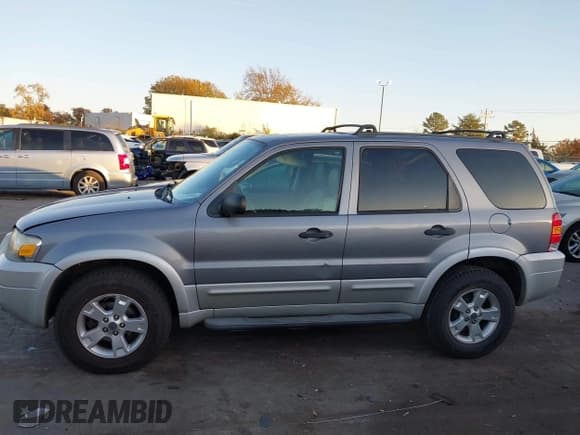 ✅ 2007 Ford Escape XLT • VIN: 1FMCU03127KA53069 • Lot: 43688852. Listed on IAAI with 161,513 mi. Free auction sales archive from the USA and detailed vehicle history report at DreamBid. Image 14.