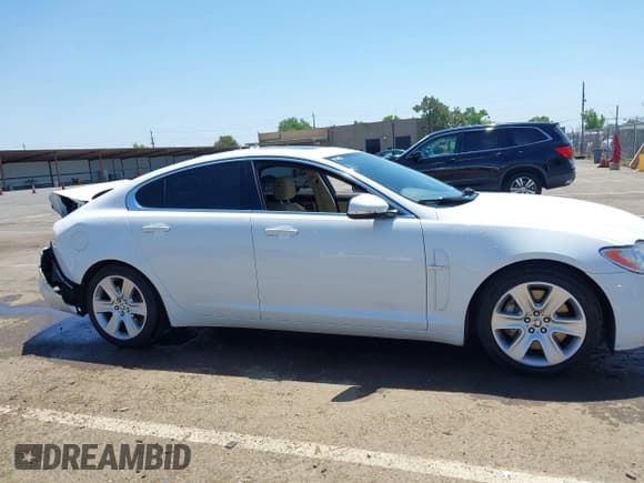 ✅ 2011 Jaguar XF • VIN: SAJWA0FB0BLS01108 • Lot: 42213548. Wystawiony na IAAI z przebiegiem 44 768 mil. Bezpłatny archiwum sprzedaży aukcyjnych z USA i szczegółowy raport historii pojazdu na DreamBid. Zdjęcie 14.