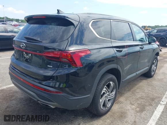 ✅ 2021 Hyundai Santa Fe SE • VIN: 5NMS1DAJ0MH318582 • Lot: 42681443. Listed on IAAI with 94,808 mi. Free auction sales archive from the USA and detailed vehicle history report at DreamBid. Image 4.