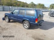 ✅ 2001 Jeep Cherokee Sport • VIN: 1J4FF58S71L502445 • Lot: 43548532. Listed on IAAI with 284,990 mi. Free auction sales archive from the USA and detailed vehicle history report at DreamBid. Image 3.