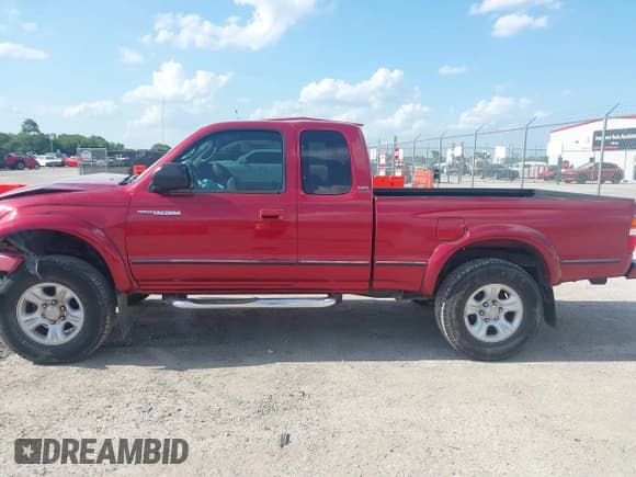 ✅ 2002 Toyota Tacoma PreRunner • VIN: 5TESN92N82Z057492 • Lot: 42711871. Listed on IAAI with 199,679 mi. Free auction sales archive from the USA and detailed vehicle history report at DreamBid. Image 14.