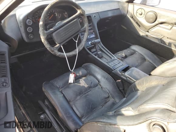 ✅ 1984 Porsche 928 • VIN: WP0JB0927ES862274 • Lot: 75285934. Wystawiony na Copart z przebiegiem 97 509 mil. Bezpłatny archiwum sprzedaży aukcyjnych z USA i szczegółowy raport historii pojazdu na DreamBid. Zdjęcie 8.