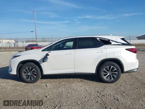 ✅ 2021 Lexus RX 350L • VIN: JTJHZKFA9M2029735 • Lot: 43685171. Listed on IAAI with 59,753 mi. Free auction sales archive from the USA and detailed vehicle history report at DreamBid. Image 14.