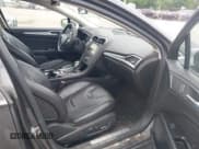 ✅ 2015 Ford Fusion Titanium Hybrid • VIN: 3FA6P0RU0FR117779 • Lot: 42365712. Listed on IAAI with 179,384 mi. Free auction sales archive from the USA and detailed vehicle history report at DreamBid. Image 5.