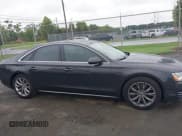 ✅ 2011 Audi A8 • VIN: WAUAVAFD2BN020842 • Lot: 42874545. Wystawiony na IAAI z przebiegiem 135 736 mil. Bezpłatny archiwum sprzedaży aukcyjnych z USA i szczegółowy raport historii pojazdu na DreamBid. Zdjęcie 13.