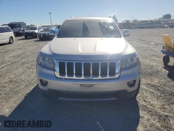 ✅ 2011 Jeep Grand Cherokee Overland • VIN: 1J4RR6GT7BC604866 • Lot: 91003765. Listed on Copart with 128,314 mi. Free auction sales archive from the USA and detailed vehicle history report at DreamBid. Image 5.