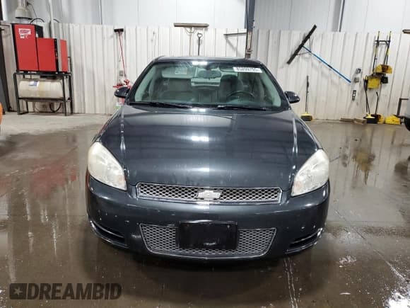 ✅ 2014 Chevrolet Impala LT • VIN: 2G1WB5E35E1112642 • Lot: 85209705. Listed on Copart with 161,688 mi. Free auction sales archive from the USA and detailed vehicle history report at DreamBid. Image 5.