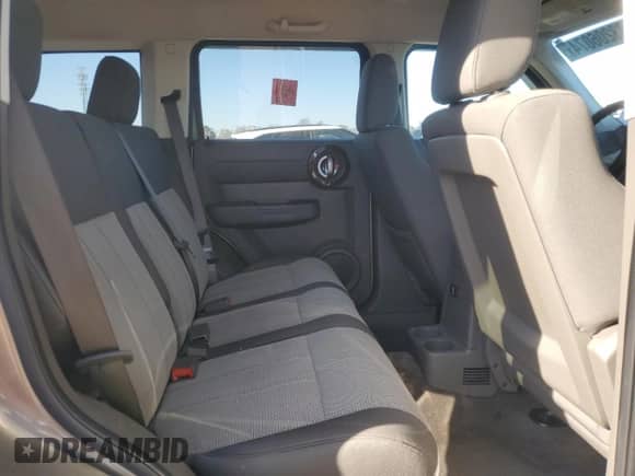 2007 Dodge Nitro SXT с VIN 1D8GU28K57W735361, выставлен на аукционе Copart как лот 83206074 с пробегом 73 567 миль миль и Списание • Salvage title. История ставок и продаж доступна на DreamBid. Изображение 12.
