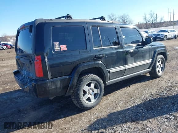 ✅ 2010 Jeep Commander Sport • VIN: 1J4RG4GK4AC158319 • Lot: 41824621. Listed on IAAI with 63,061 mi. Free auction sales archive from the USA and detailed vehicle history report at DreamBid. Image 4.