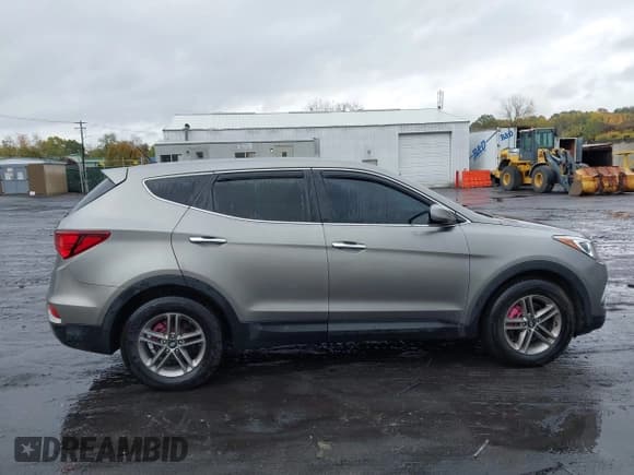 ✅ 2018 Hyundai Santa Fe 2.4L • VIN: 5NMZTDLB2JH095519 • Лот: 43462708. Опубликован ранее на IAAI с пробегом 87 498 миль. Бесплатный доступ к архиву аукционных продаж из США и подробный отчёт об истории автомобиля на DreamBid. Изображение 13.