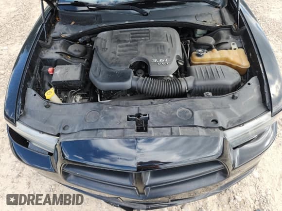 ✅ 2013 Dodge Charger Police • VIN: 2C3CDXAG1DH670569 • Lot: 84860955. Listed on Copart with 111,155 mi. Free auction sales archive from the USA and detailed vehicle history report at DreamBid. Image 11.