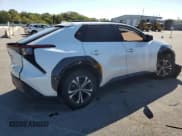 ✅ 2023 Toyota bZ4X XLE • VIN: JTMABACA7PA031081 • Lot: 80805895. Listed on Copart with 33,572 mi. Free auction sales archive from the USA and detailed vehicle history report at DreamBid. Image 3.