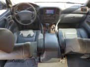 ✅ 1999 Toyota Land Cruiser • VIN: JT3HT05J2X0032345 • Lot: 84022835. Wystawiony na Copart z przebiegiem 261 049 mil. Bezpłatny archiwum sprzedaży aukcyjnych z USA i szczegółowy raport historii pojazdu na DreamBid. Zdjęcie 8.