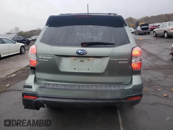 ✅ 2014 Subaru Forester Limited • VIN: JF2SJAHC7EH450314 • Lot: 90438095. Wystawiony na Copart z przebiegiem 204 063 mil. Bezpłatny archiwum sprzedaży aukcyjnych z USA i szczegółowy raport historii pojazdu na DreamBid. Zdjęcie 6.