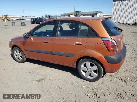 ✅ 2007 Kia Rio SX • VIN: KNADE163276233067 • Лот: 68555755. Опубликован ранее на Copart с пробегом 150 206 миль. Бесплатный доступ к архиву аукционных продаж из США и подробный отчёт об истории автомобиля на DreamBid. Изображение 2.