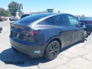 ✅ 2025 Tesla Model Y Long Range • VIN: 7SAYGDEE9SF269051 • Lot: 42984977. Listed on IAAI with 10,617 mi. Free auction sales archive from the USA and detailed vehicle history report at DreamBid. Image 4.