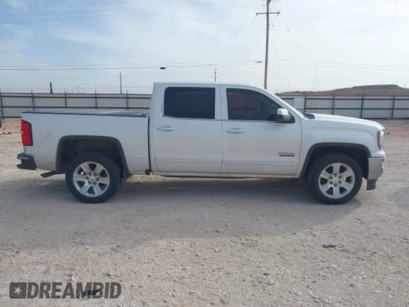 ✅ 2017 GMC Sierra 1500 SLE • VIN: 3GTP1MEC3HG198599 • Lot: 41793527. Listed on IAAI with 143,207 mi. Free auction sales archive from the USA and detailed vehicle history report at DreamBid. Image 13.