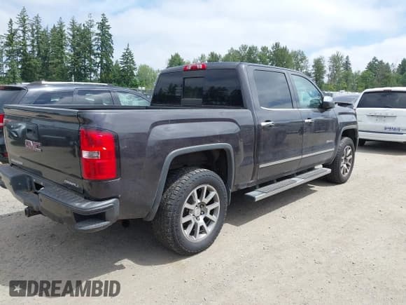 ✅ 2015 GMC Sierra 1500 Denali • VIN: 3GTU2WEJ6FG513774 • Lot: 42476107. Listed on IAAI with 122,961 mi. Free auction sales archive from the USA and detailed vehicle history report at DreamBid. Image 4.