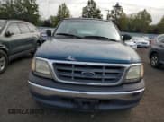 ✅ 2001 Ford F-150 XL • VIN: 1FTRF17W71NA44992 • Lot: 81205035. Listed on Copart with 125,671 mi. Free auction sales archive from the USA and detailed vehicle history report at DreamBid. Image 5.