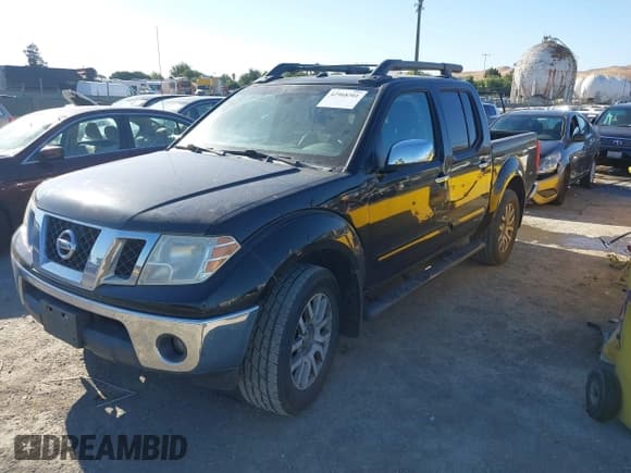 ✅ 2011 Nissan Frontier Pro-4X • VIN: 1N6AD0EV7BC440969 • Lot: 42968301. Listed on IAAI with 165,210 mi. Free auction sales archive from the USA and detailed vehicle history report at DreamBid. Image 17.