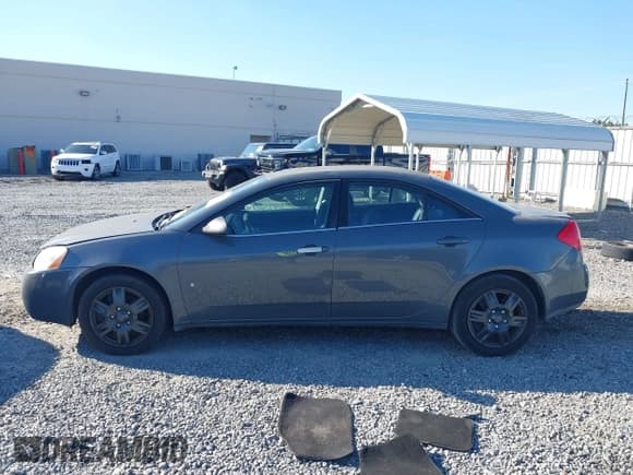 ✅ 2008 Pontiac G6 1SV Value Leader • VIN: 1G2ZF57B584229132 • Lot: 43691680. Wystawiony na IAAI z przebiegiem 199 326 mil. Bezpłatny archiwum sprzedaży aukcyjnych z USA i szczegółowy raport historii pojazdu na DreamBid. Zdjęcie 15.