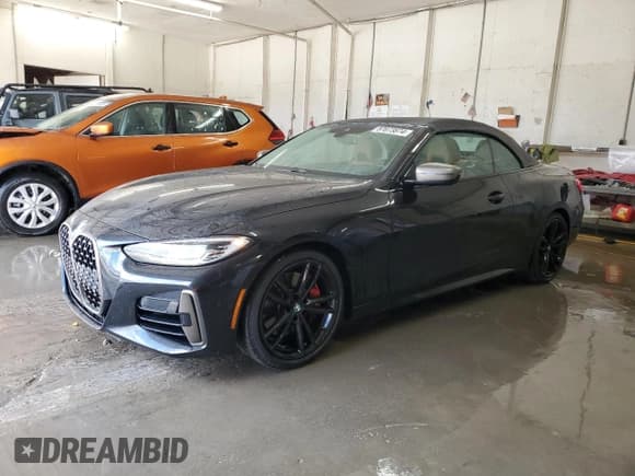 ✅ 2021 BMW 4 Series M440i • VIN: WBA53AT03MCG20974 • Lot: 87073874. Wystawiony na Copart z przebiegiem 22 801 mil. Bezpłatny archiwum sprzedaży aukcyjnych z USA i szczegółowy raport historii pojazdu na DreamBid. Zdjęcie 1.