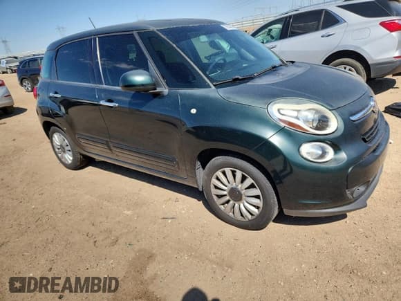 ✅ 2014 FIAT 500L Easy • VIN: ZFBCFABH8EZ024685 • Лот: 72014645. Опубликован ранее на Copart с пробегом 83 471 миль. Бесплатный доступ к архиву аукционных продаж из США и подробный отчёт об истории автомобиля на DreamBid. Изображение 4.