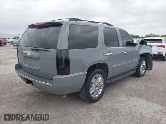 ✅ 2009 Chevrolet Tahoe LTZ • VIN: 1GNFC33099R297719 • Lot: 42064490. Listed on IAAI with 215,466 mi. Free auction sales archive from the USA and detailed vehicle history report at DreamBid. Image 4.
