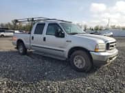 ✅ 2003 Ford F-250 XL • VIN: 1FTNW20PX3ED26912 • Lot: 52461075. Listed on Copart with 90,804 mi. Free auction sales archive from the USA and detailed vehicle history report at DreamBid. Image 4.