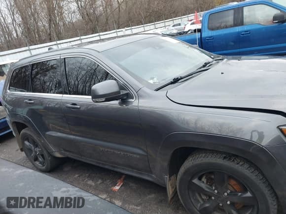 ✅ 2015 Jeep Grand Cherokee Overland • VIN: 1C4RJFCM6FC195180 • Lot: 40758296. Listed on IAAI with 77,428 mi. Free auction sales archive from the USA and detailed vehicle history report at DreamBid. Image 13.