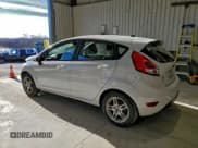 ✅ 2018 Ford Fiesta SE • VIN: 3FADP4EJ9JM122849 • Lot: 93434235. Listed on Copart with 104,514 mi. Free auction sales archive from the USA and detailed vehicle history report at DreamBid. Image 2.