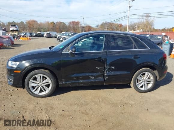 ✅ 2015 Audi Q3 Prestige • VIN: WA1GFCFS9FR004358 • Lot: 43604261. Listed on IAAI with 81,990 mi. Free auction sales archive from the USA and detailed vehicle history report at DreamBid. Image 14.