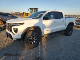 ✅ 2023 GMC Canyon 4WD AT4X • VIN: 1GTP6EEK6P1235575 • Лот: 88637835. Опубликован ранее на Copart с пробегом 30 938 миль. Бесплатный доступ к архиву аукционных продаж из США и подробный отчёт об истории автомобиля на DreamBid. Изображение 1.