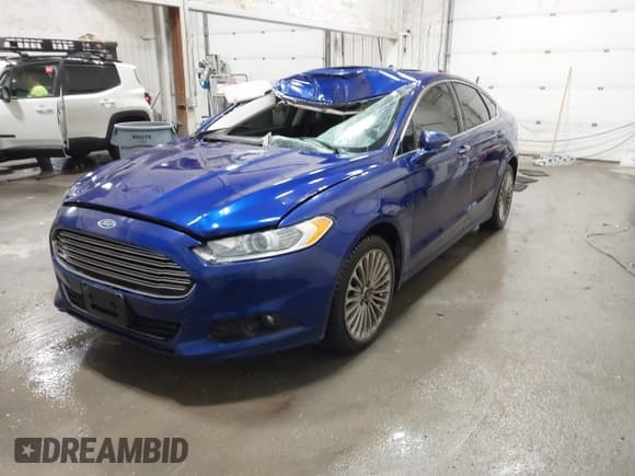 ✅ 2014 Ford Fusion Titanium • VIN: 3FA6P0D97ER317642 • Lot: 43507222. Listed on IAAI with 148,357 mi. Free auction sales archive from the USA and detailed vehicle history report at DreamBid. Image 2.