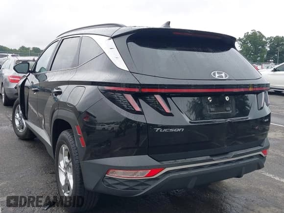 ✅ 2022 Hyundai Tucson SEL • VIN: KM8JBCAE6NU031615 • Lot: 42887395. Listed on IAAI with 63,078 mi. Free auction sales archive from the USA and detailed vehicle history report at DreamBid. Image 3.